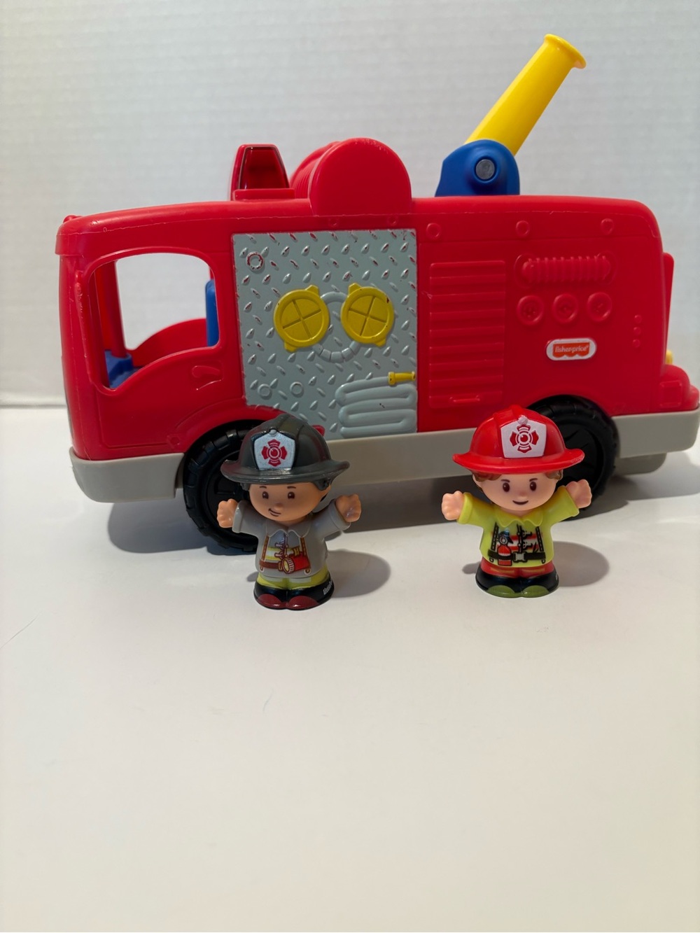 Little People Helping Others Fire Truck